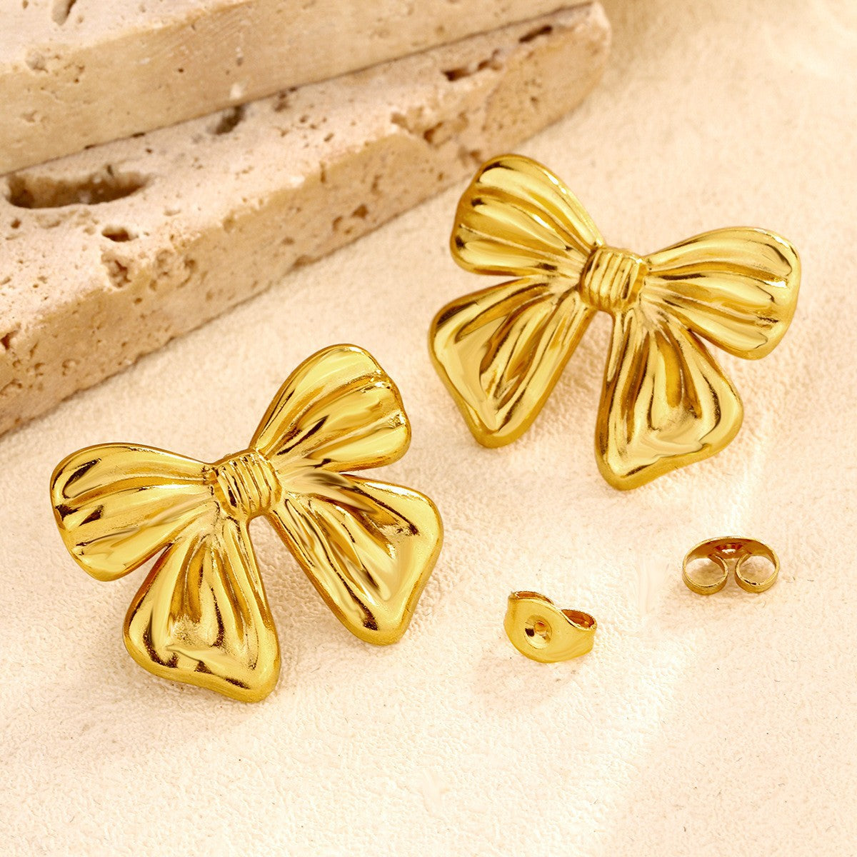 bow stud earrings