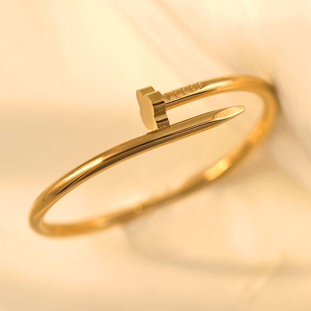 gold nail bracelet