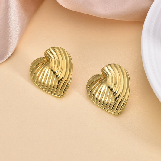 Heart statement earrings