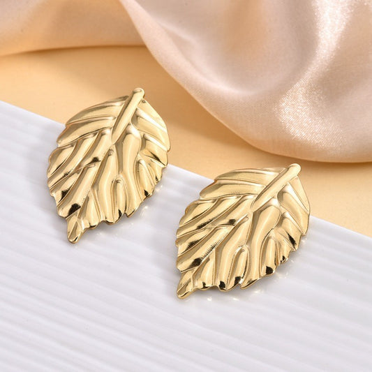 Gold tone leaf  stud earrings