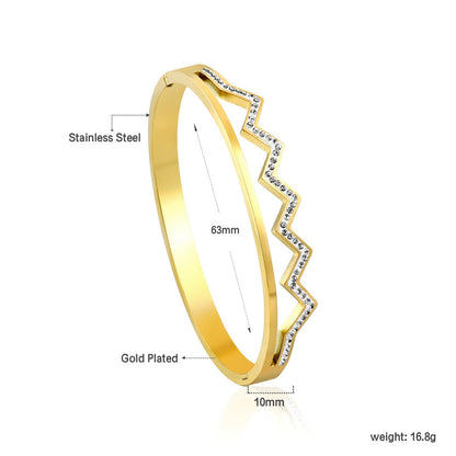 Wavy, diamond-studded hard bracelet like a crown