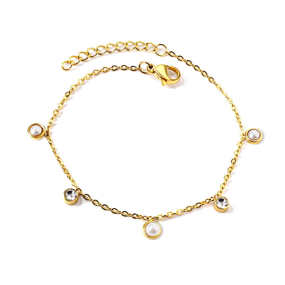 3 round white half pearls + 2 cylindrical white diamonds bracelet