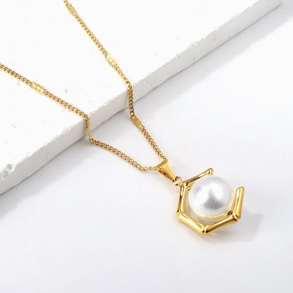 Pentagonal + white pearl pendant necklace