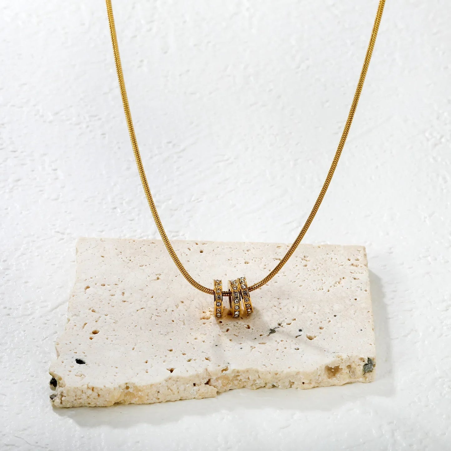 hollow three-rings pendant with rhinestones